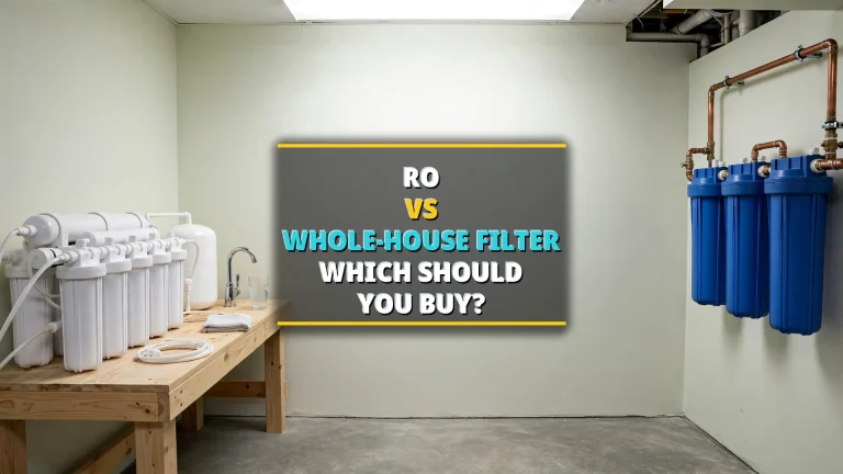 Under-sink reverse-osmosis system beside a whole-house water filter tank — RO vs whole-house filter comparison 2026